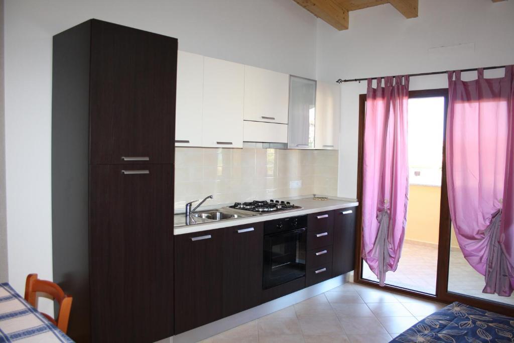 Appartamenti Ideal Isola Rossa Quarto foto