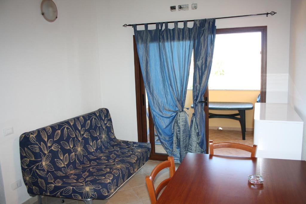 Appartamenti Ideal Isola Rossa Quarto foto